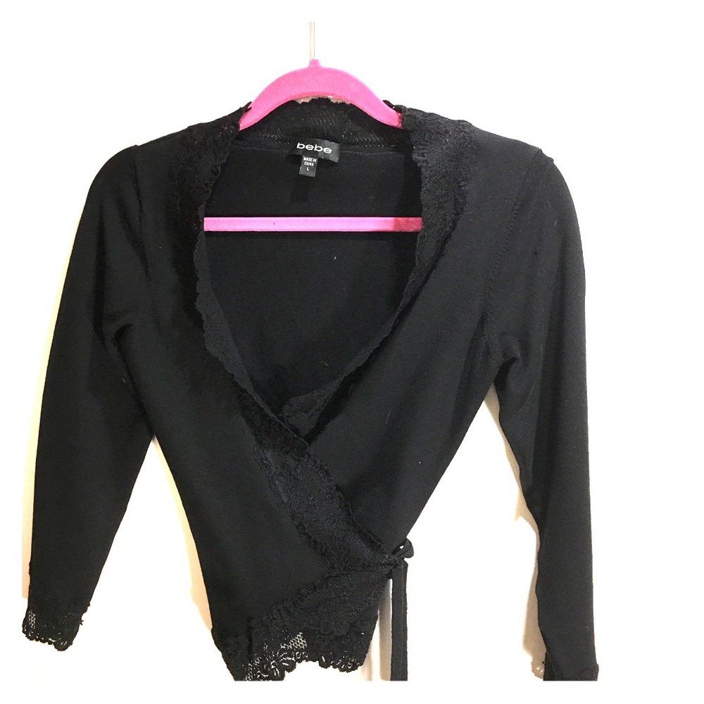 BEBE Black stretchy wrap around sweater